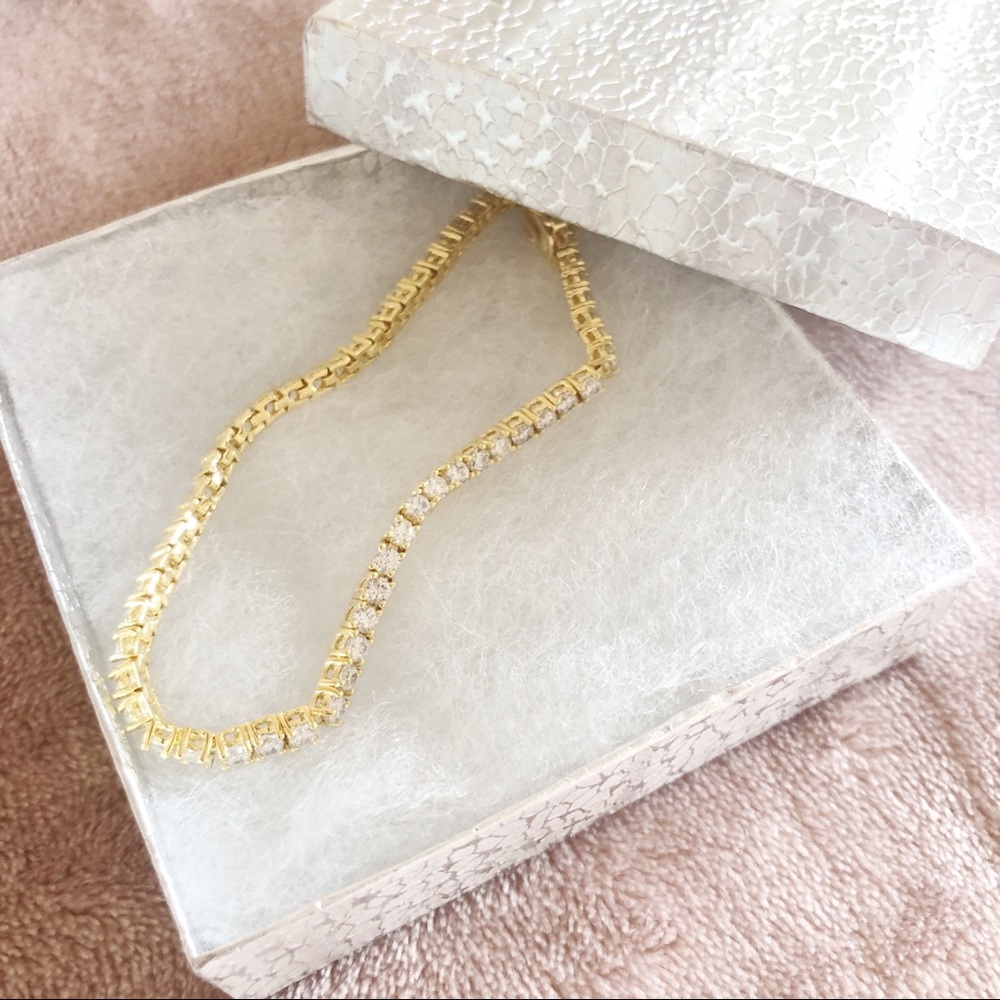 CZ yellow gold plated tennis bracelet 7”
